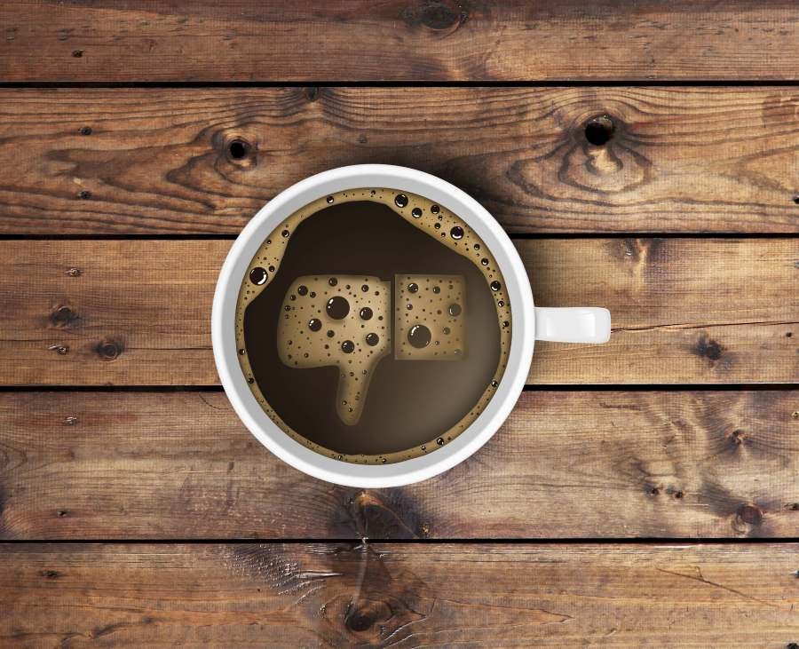 coffee mug with facebook like logo as a thumbs down