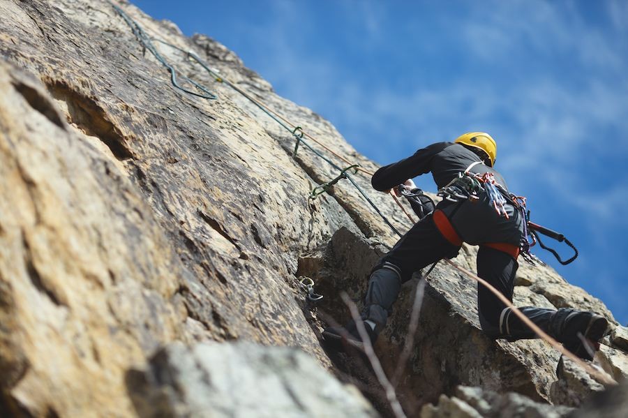 Starting a rental business feat. adventure outdoor climber on rock