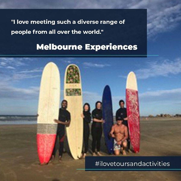 Group of surfers holding boards with quote