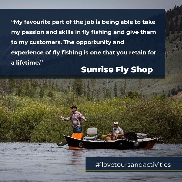 Two people fly fishing in boat with quote