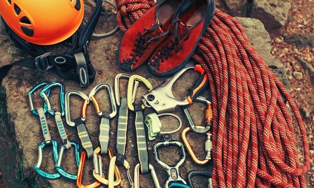 Climbing gear laid out on a rock