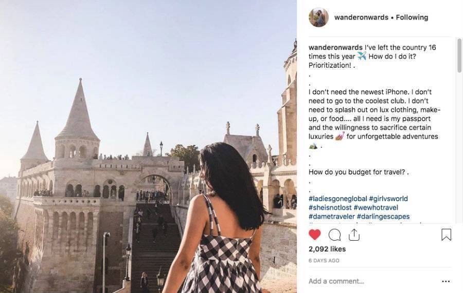 Wander Onwards Instagram post of Vanessa looking at castle view giving tips on budgeting for travel