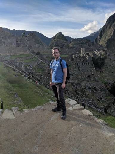 Scott standing in front of Machu Picchu.
