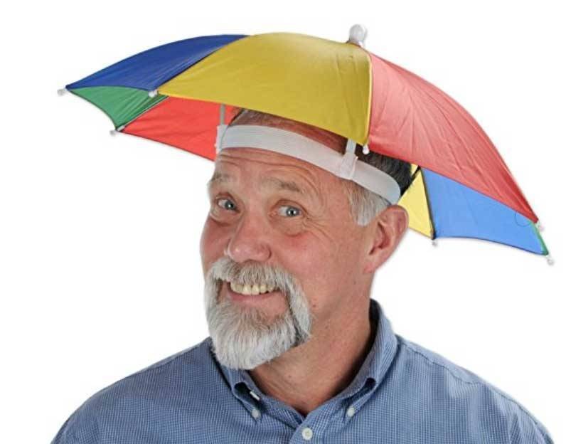 Man wearing umbrella hat